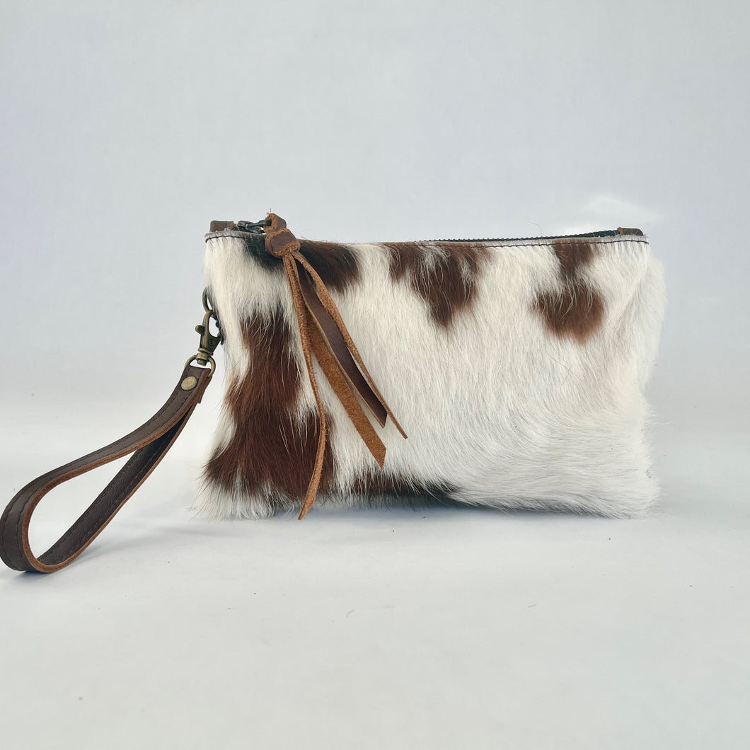 Cowhide wristlet in brown and white